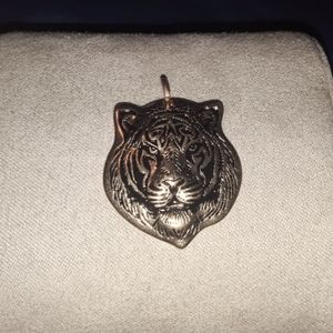 Gold tone tiger pendant